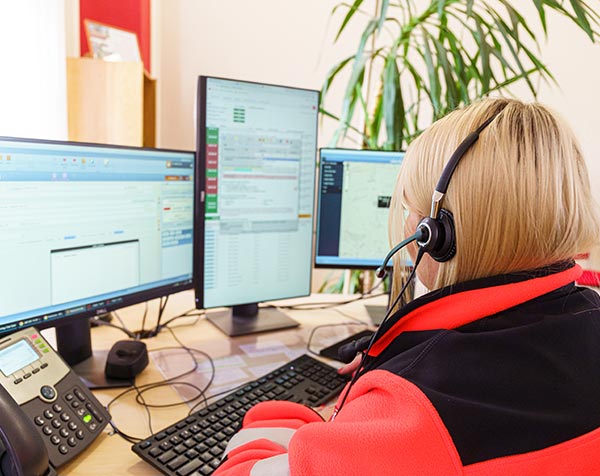Photo of a technical worker using emergency response information systems