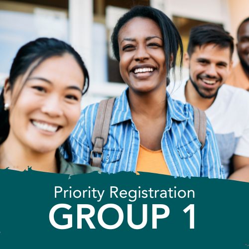 Group of adult students behind text that says Group 1