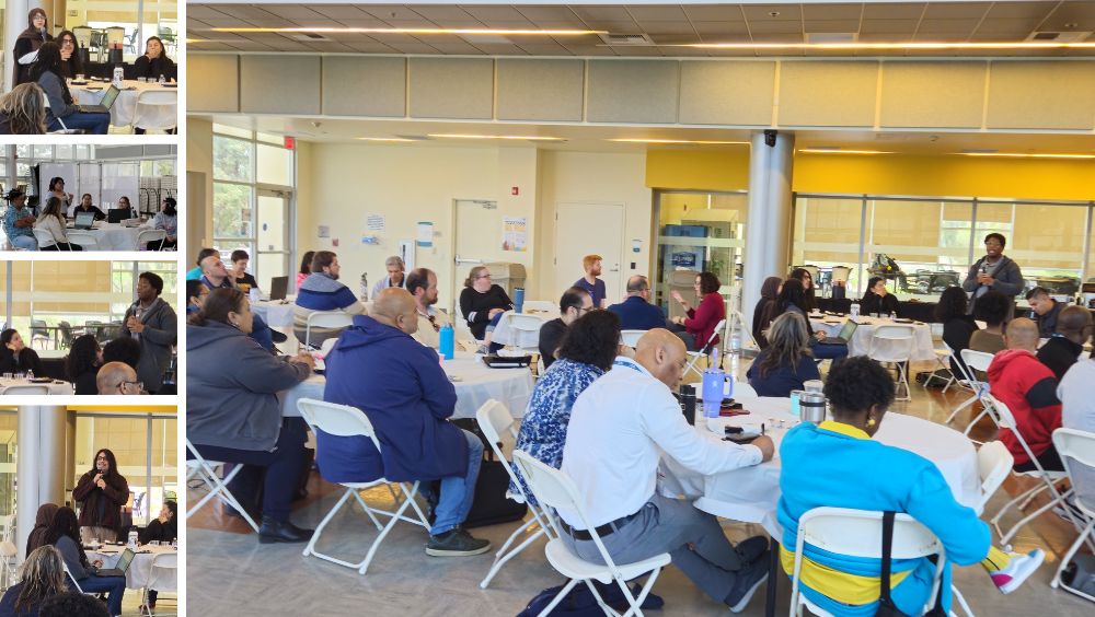 Groups of people sit at tables in SAS 121 working collaboratively on strategic plan updates