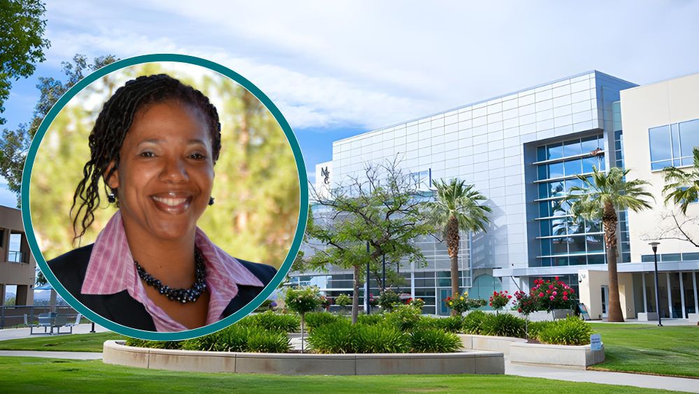 Photo of LaTonya Parker in front of the SAS building exterior