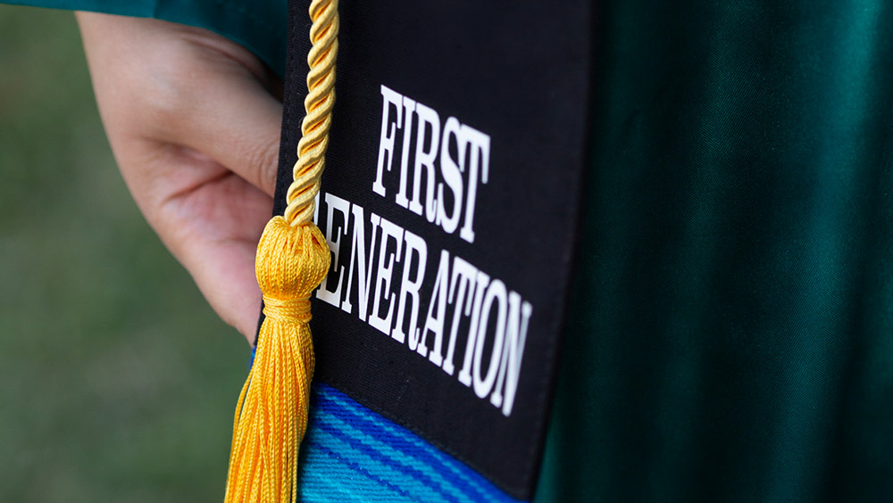 A close-up of an MVC grad's first generation sash and Honors cord